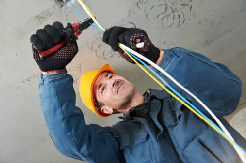 Electrician cutting wires
